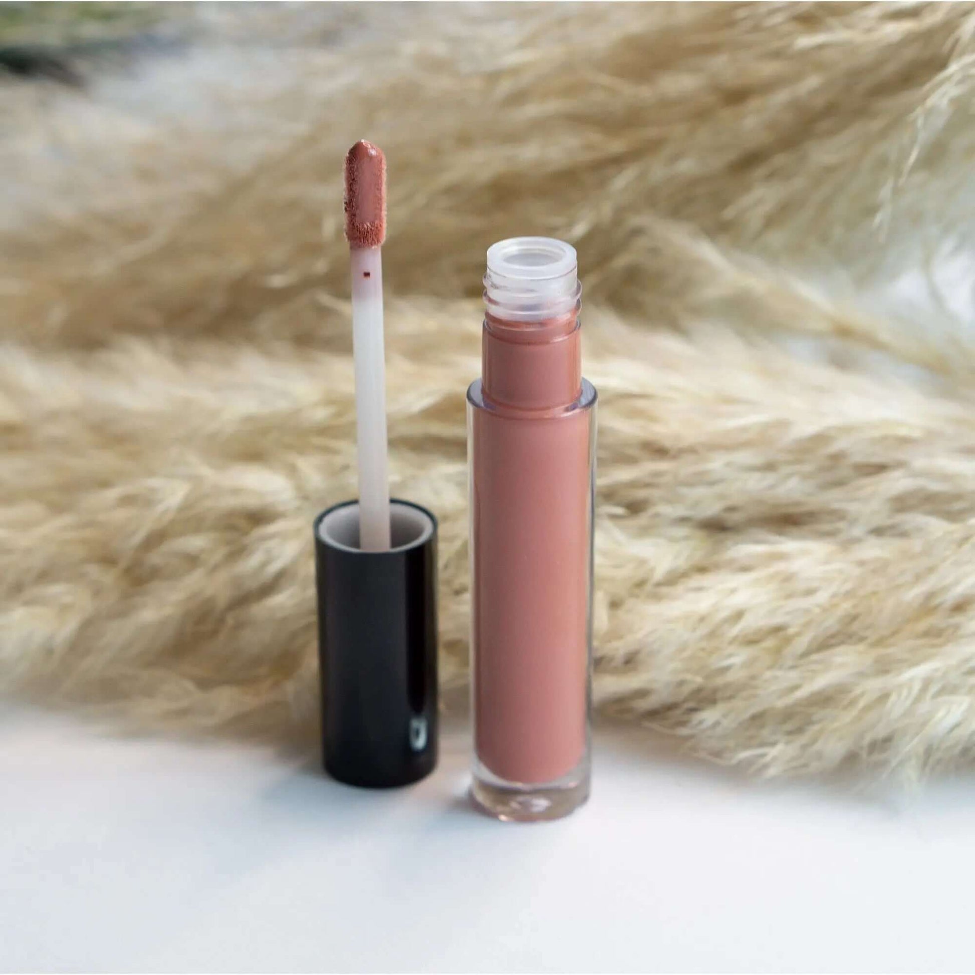 Illuminate Your Lips with Rouge Lip Gloss - The Perfect Touch of Color and Shine